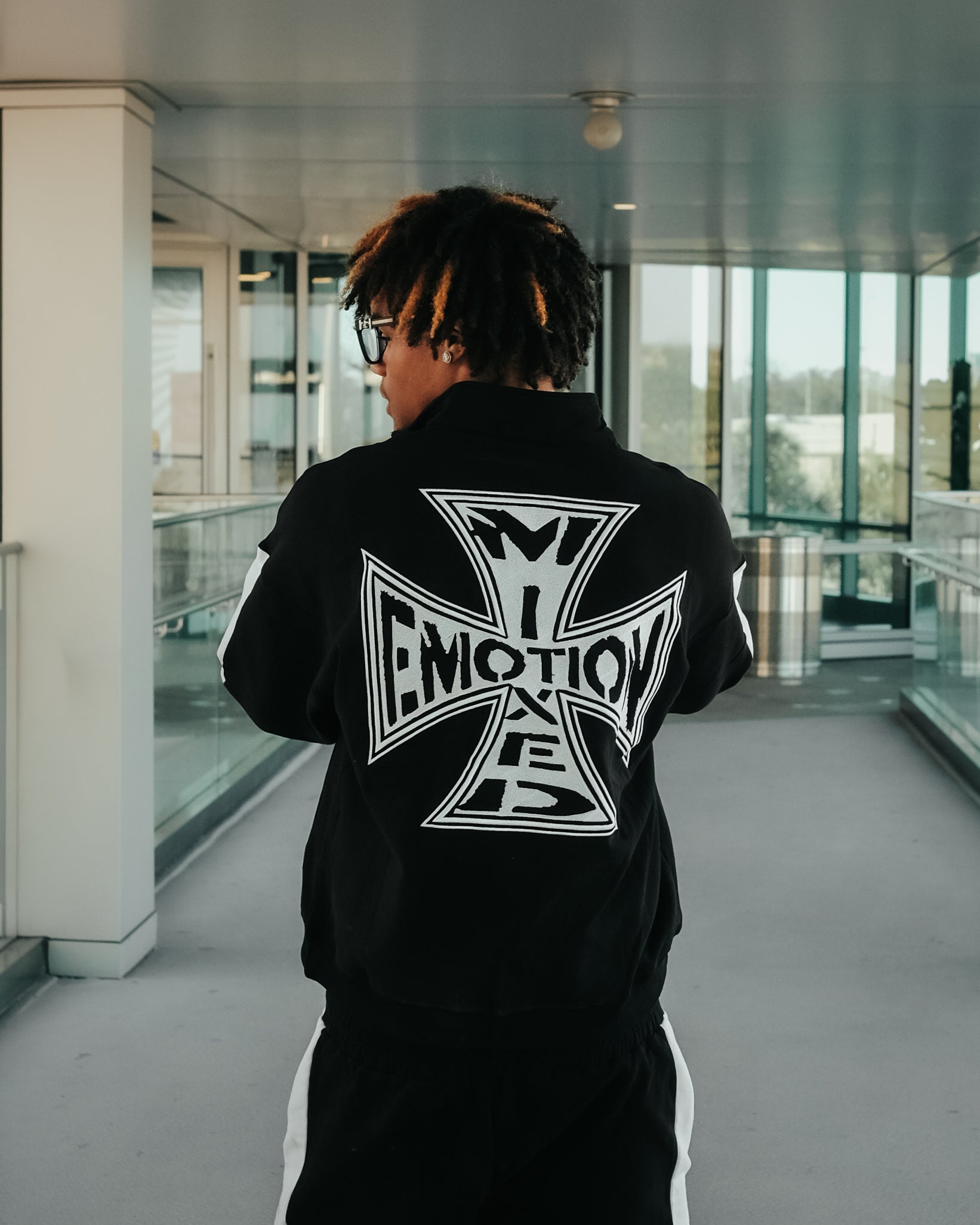 Black “Quarter” zip Jacket – Mixed Emotion