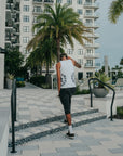 2 Pack White “Script” Tank Tops